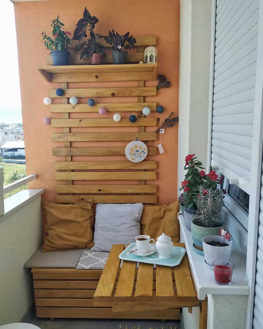 Apartment patio with wood pallet furniture