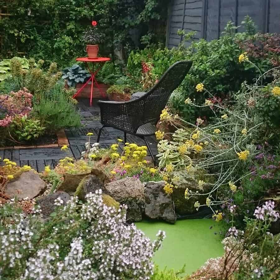 Serene garden nook with pond and lounge chair