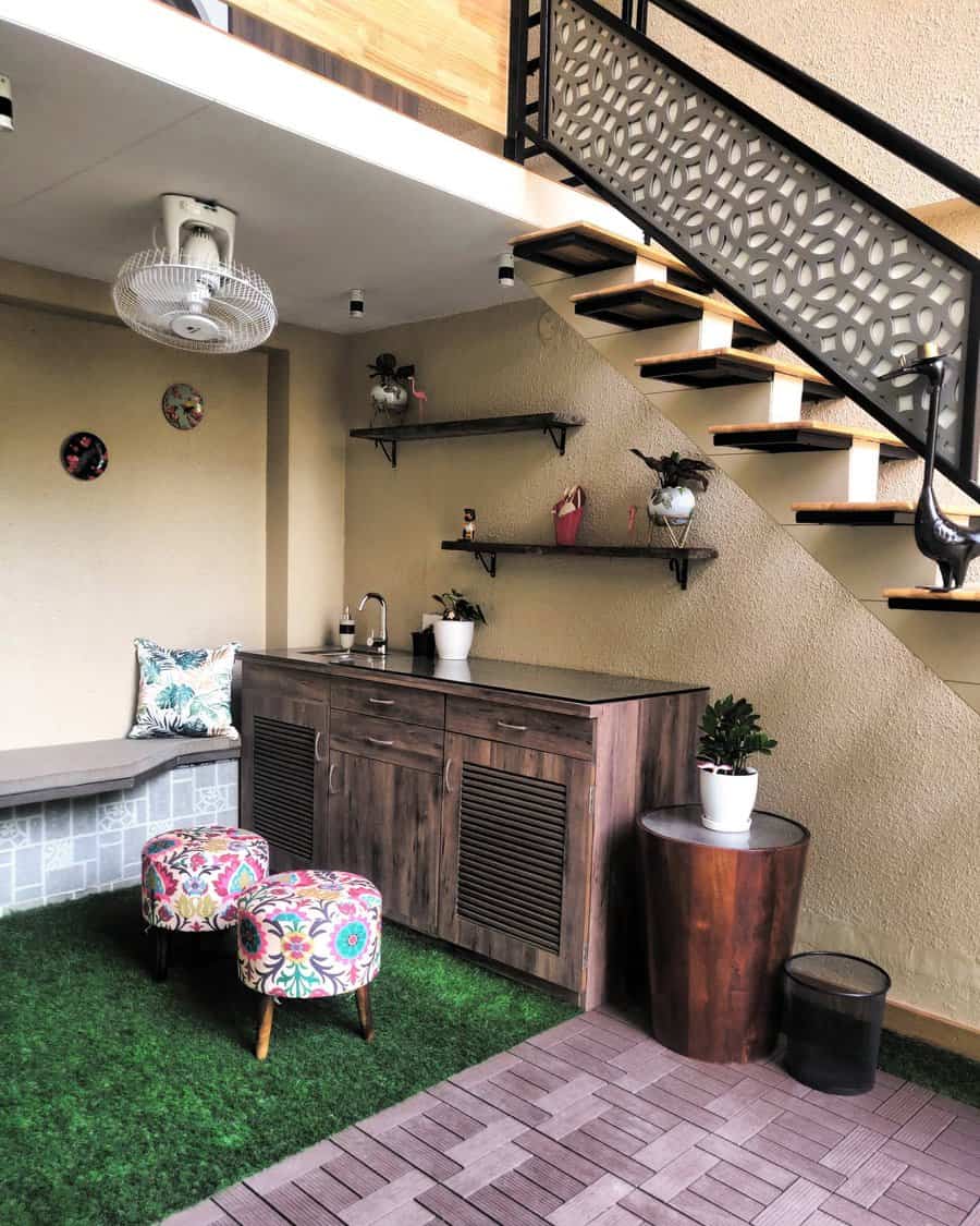 Quirky nook with artificial grass and decorative stools