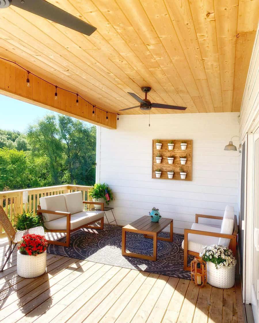 Covered deck with sofa couches