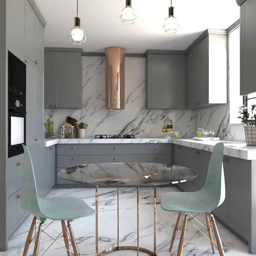 Elegant kitchen with marble countertops and a round table