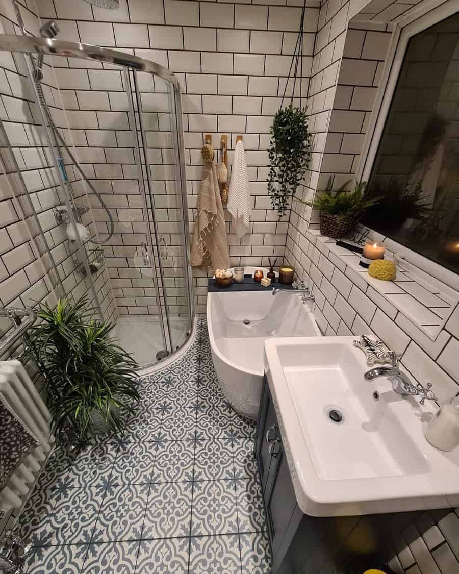 Cozy bathroom with corner shower and patterned tiles