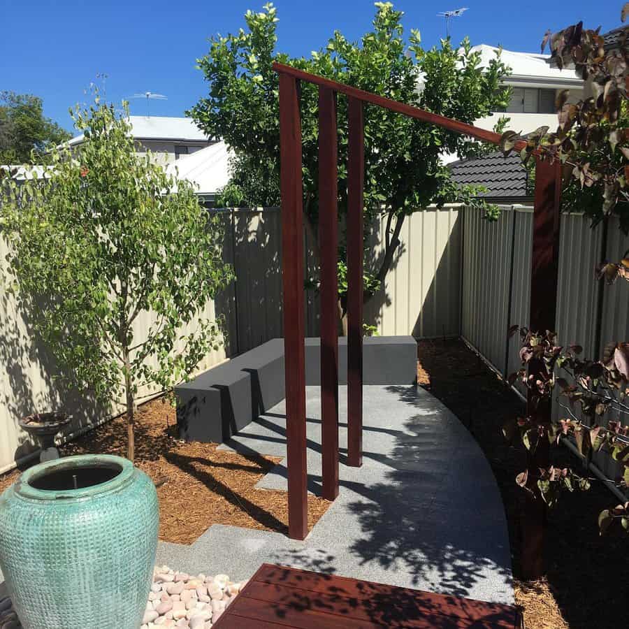 Concrete pavers with green scape patches