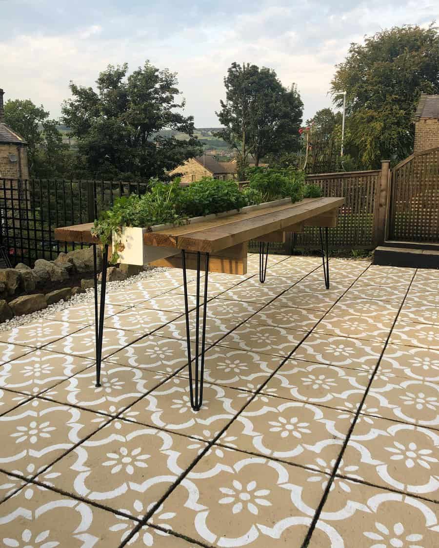 A garden table adorned with various plants