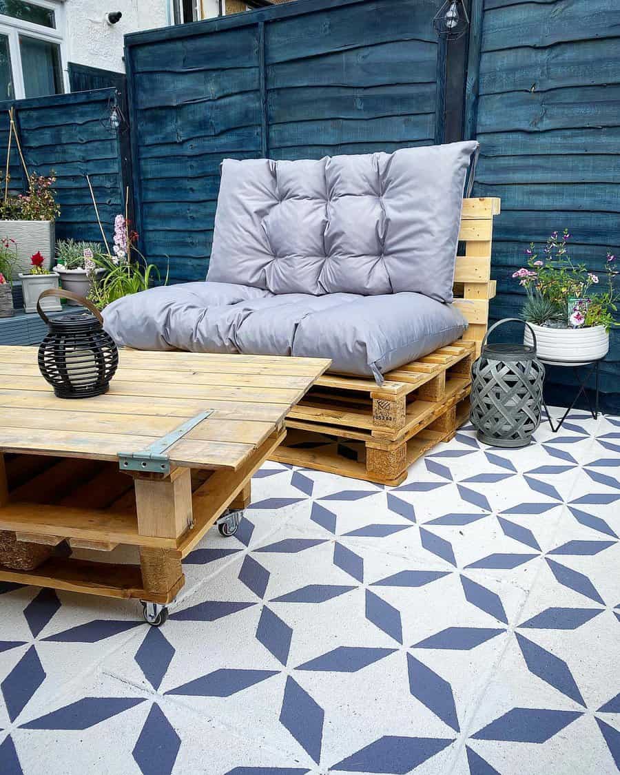 Serene patio with blue fence and couch