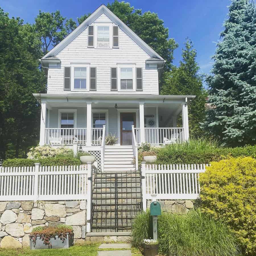 Colonial house with picket fence