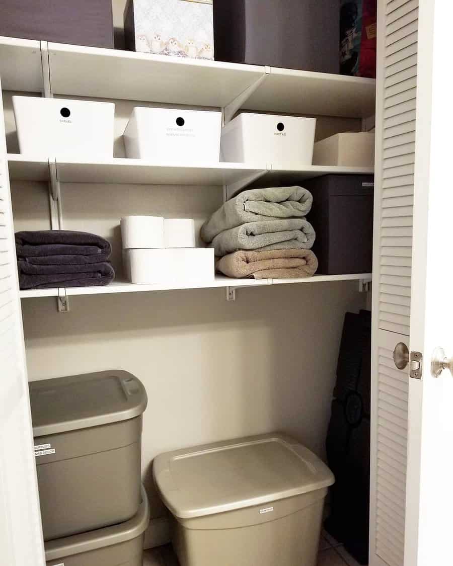 Bathroom closet with boxes