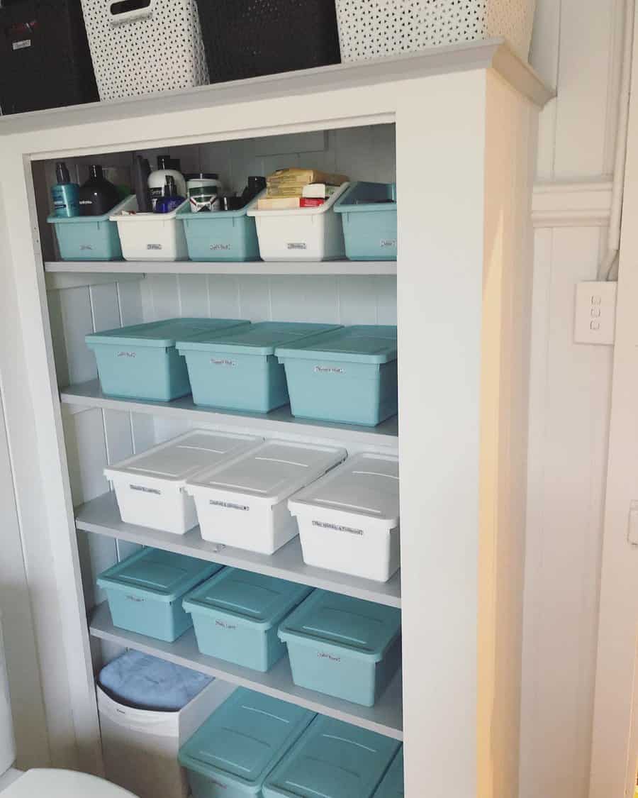 Bathroom closet with plastic containers