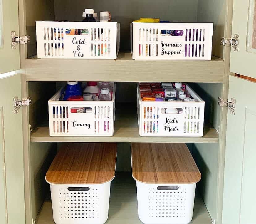 Bathroom closet with labeled plastic organizer