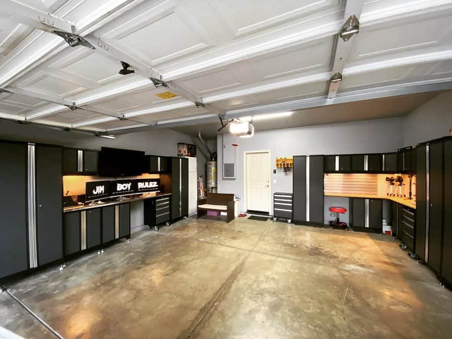 garage man cave with shelving units
