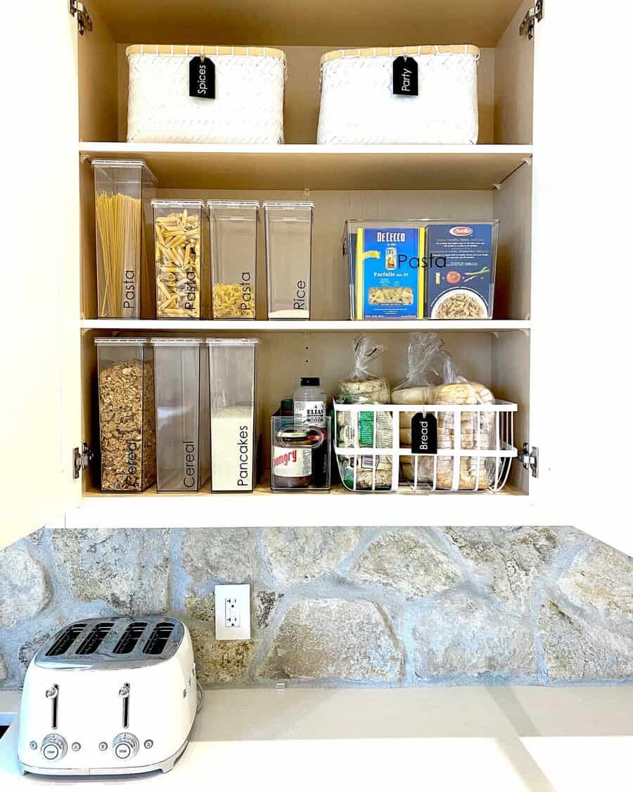 Pantry shelf with plastic organizers 