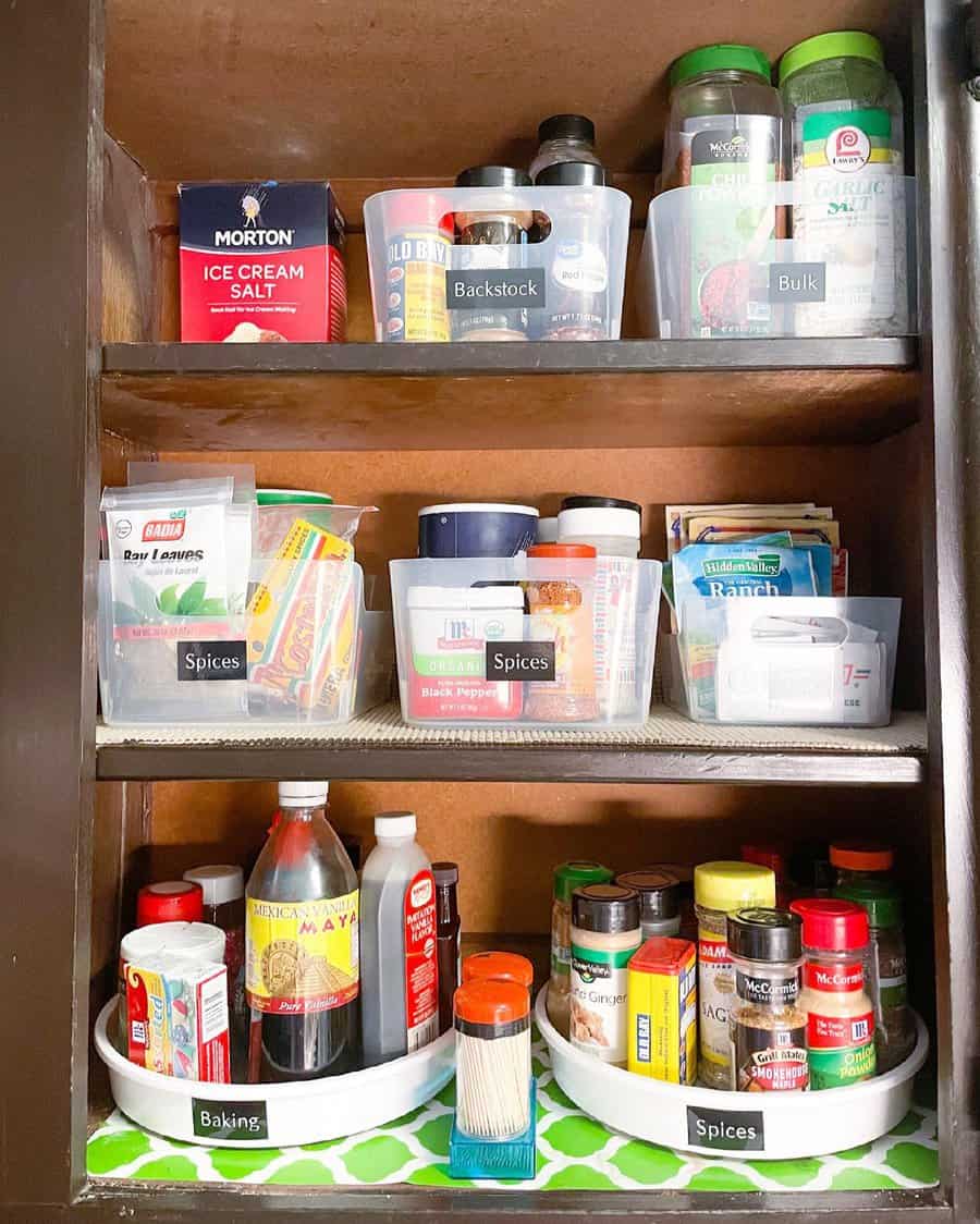 Pantry shelf with plastic organizers 