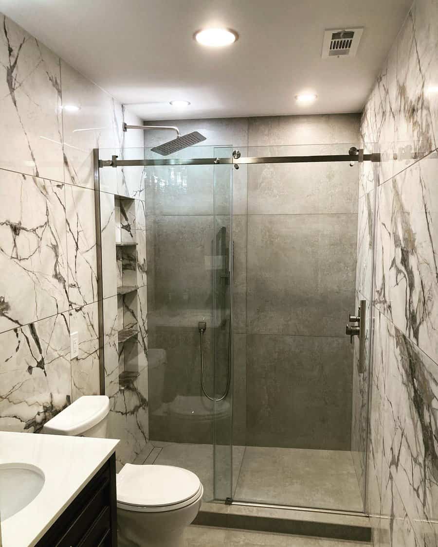 Basement bathroom with marble and concrete tiles