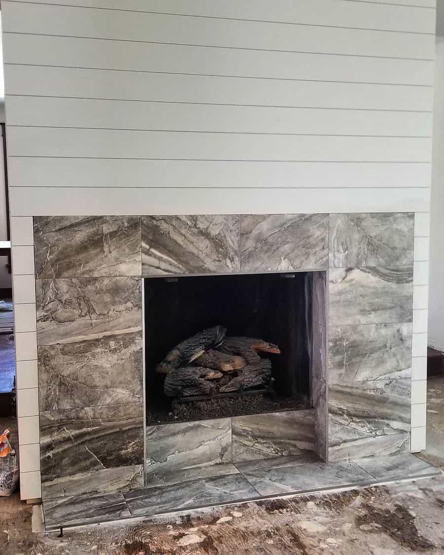 Grey marble fireplace wall