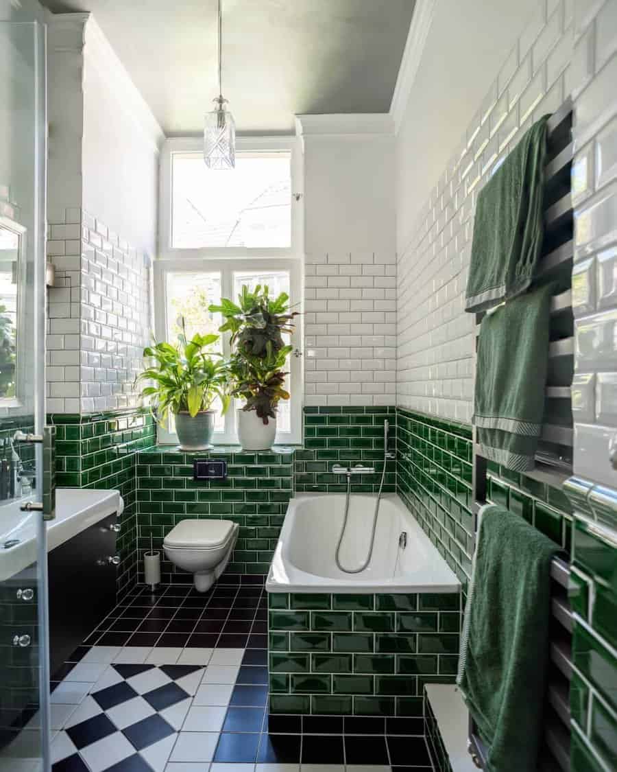 Vintage bathroom with checkered floor and green subway tiles