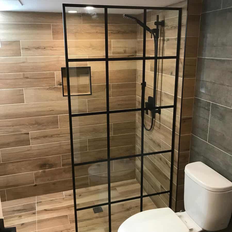 rustic walk-in shower with wood tiles