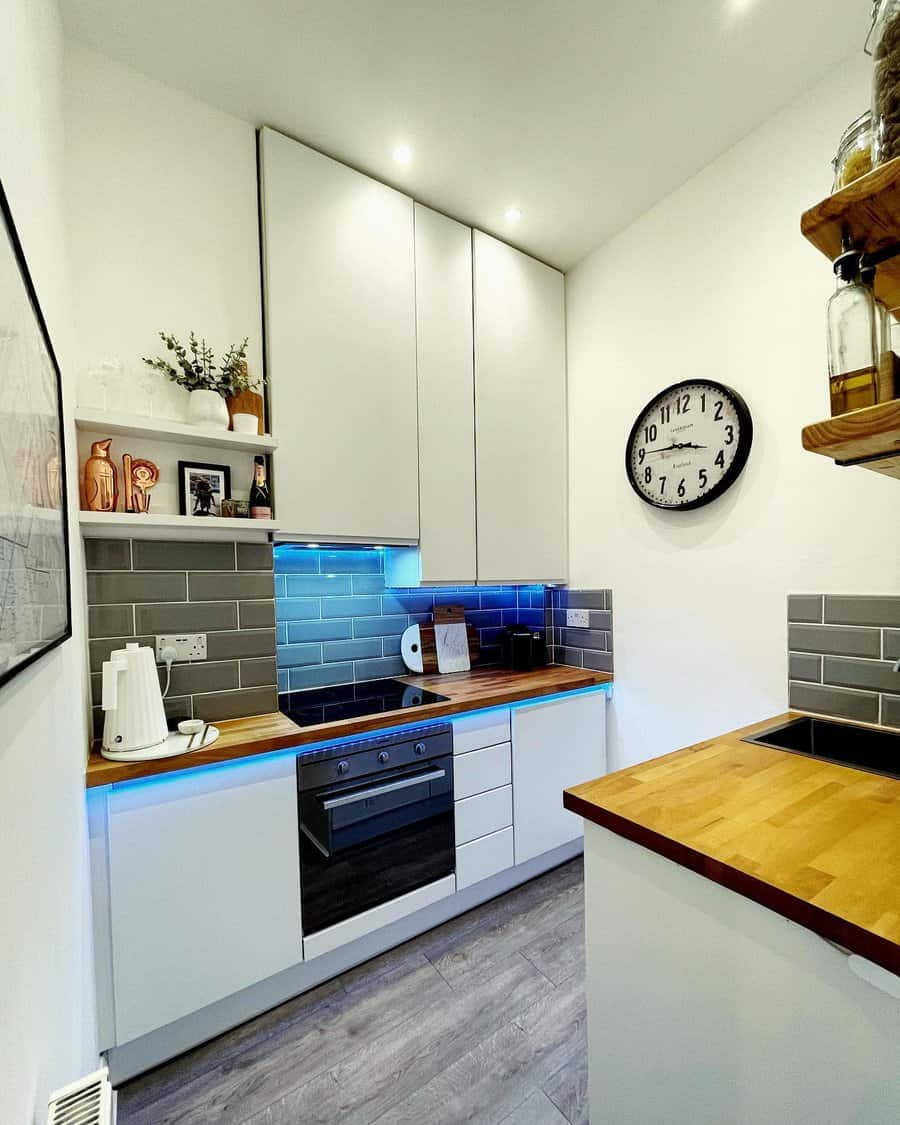 small galley kitchen with beveled tiles