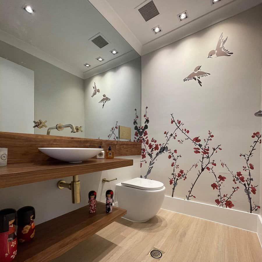 Bathroom with floral wall art and wooden accents