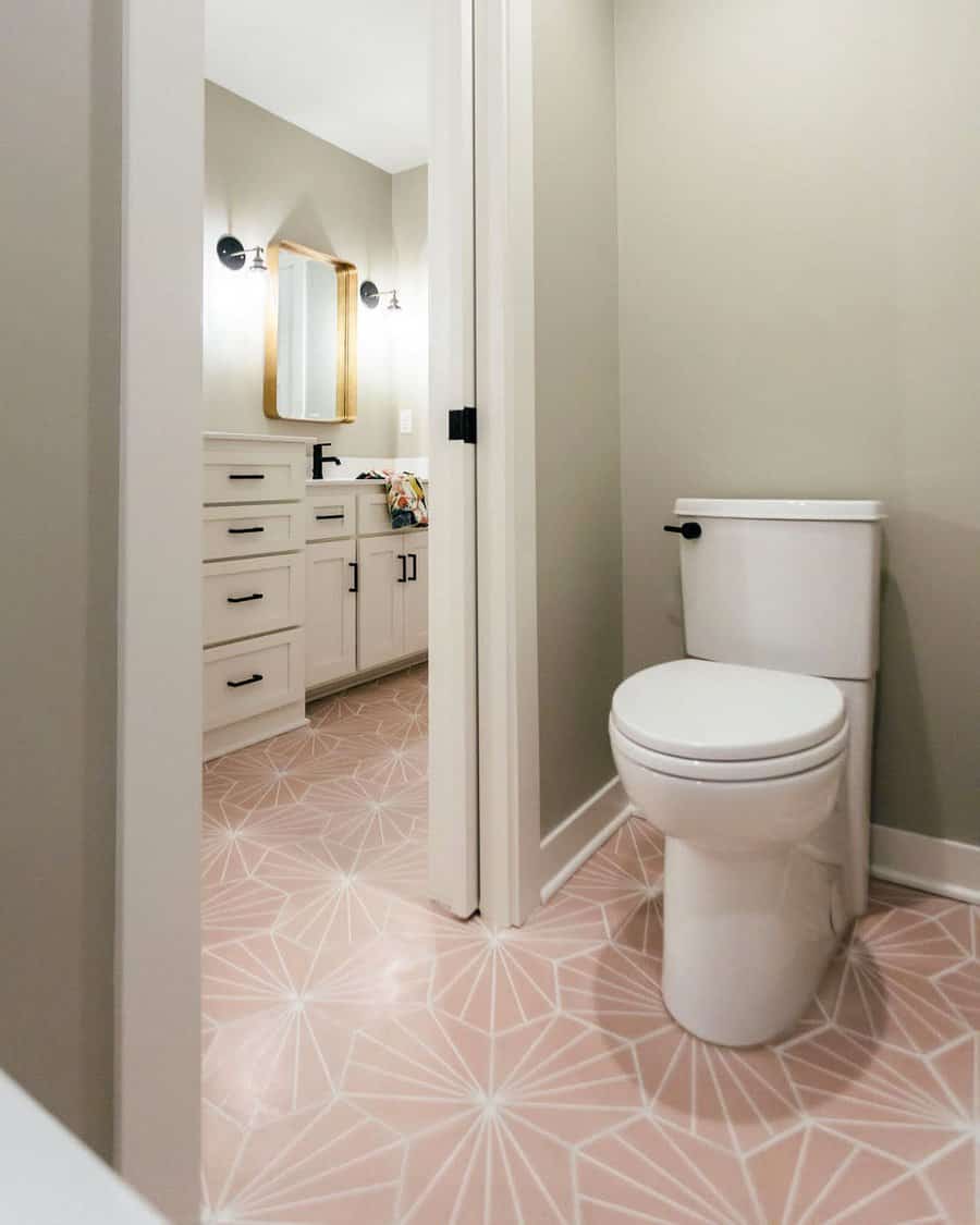 Chic bathroom with patterned floor tiles and wooden vanity