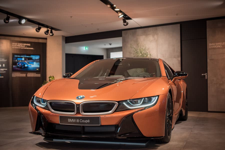 BMW i8 Coupé in showroom with track lighting