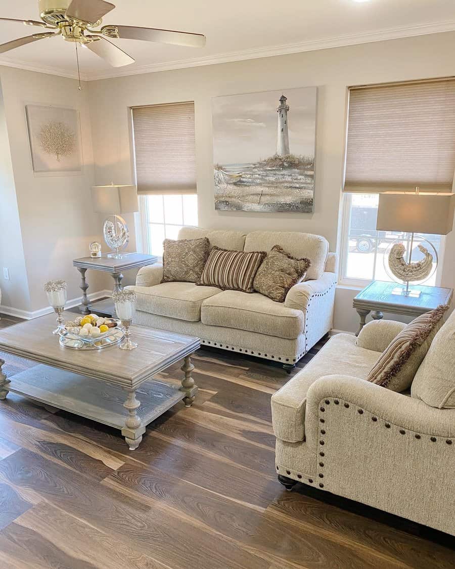 Coastal themed living room with nautical accents and plush sofa