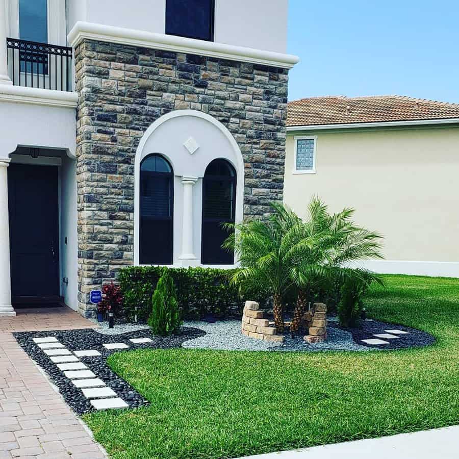 Front garden with pavers on grass