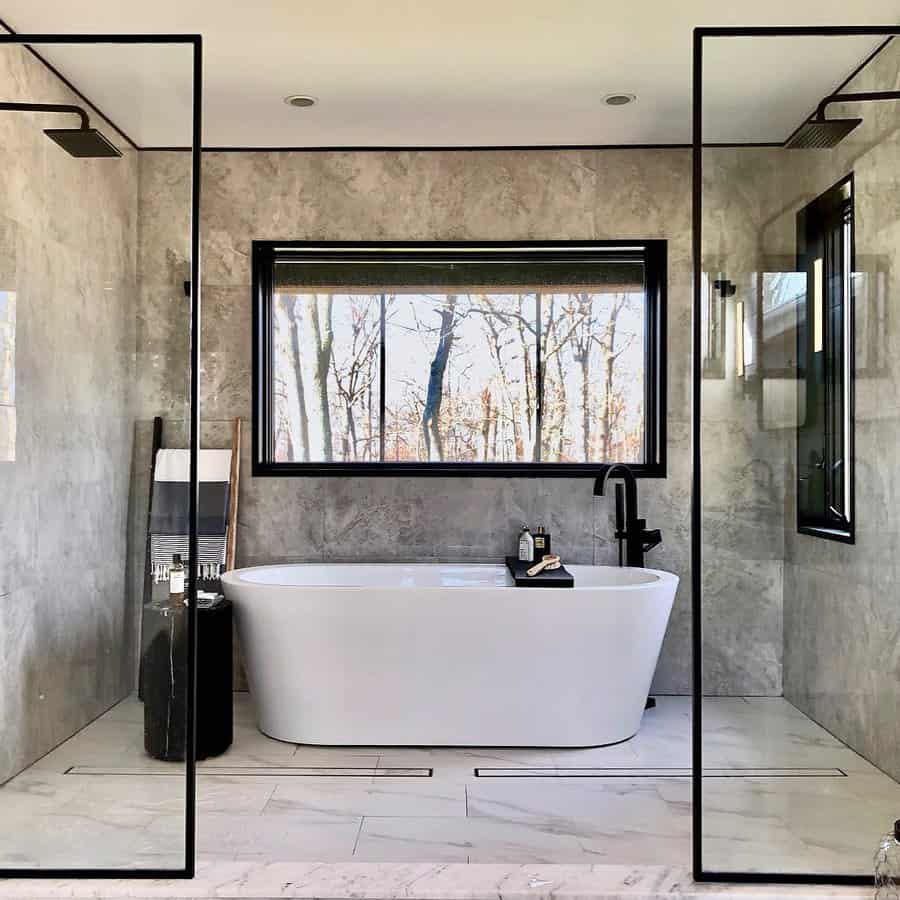 Freestanding tub in a sleek and gray-toned bathroom