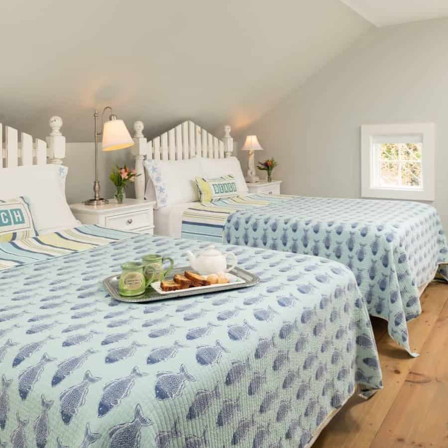 Coastal themed twin bedroom with seashell bedding