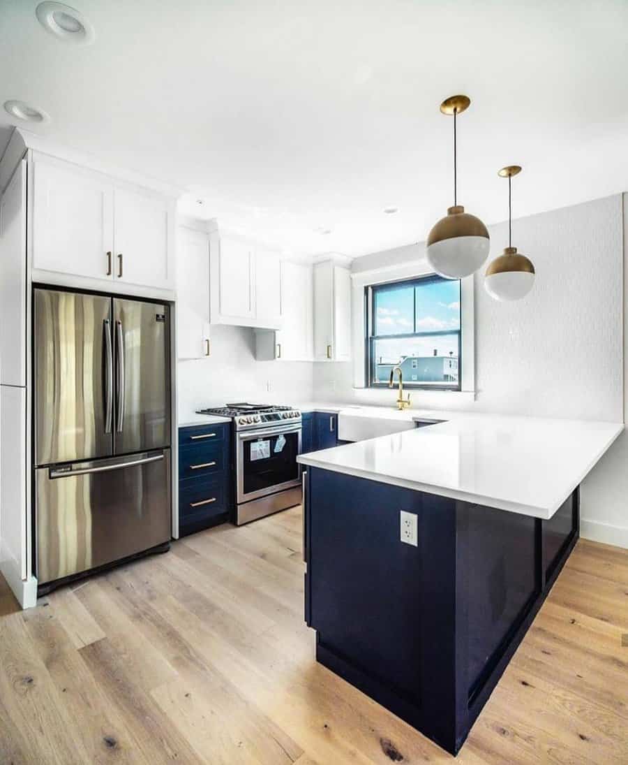 Modern kitchen with gold fixtures 