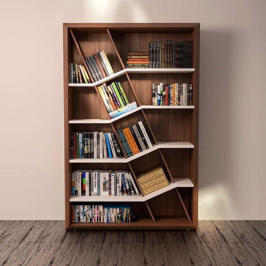 Modern bookshelf with an artistic geometric design, featuring angled compartments that create a dynamic and stylish way to store books.