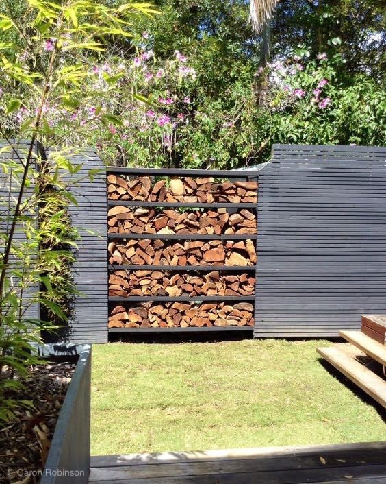 patio privacy wall firewood storage