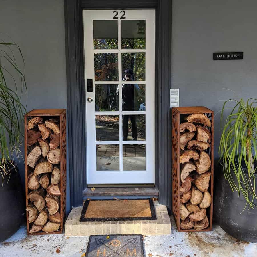 two firewood shelves on each side of the door