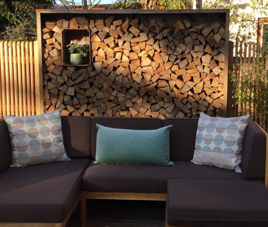 patio privacy wall firewood storage