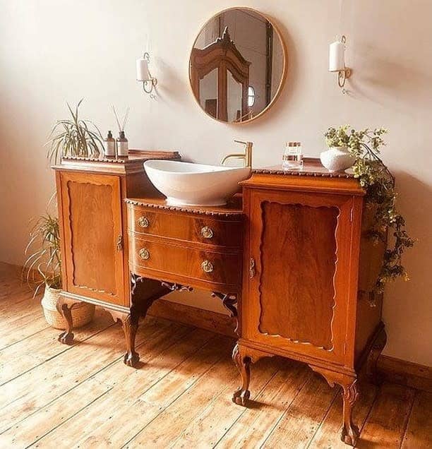 Bohemian bathroom with ornate wooden vanity and vessel sink