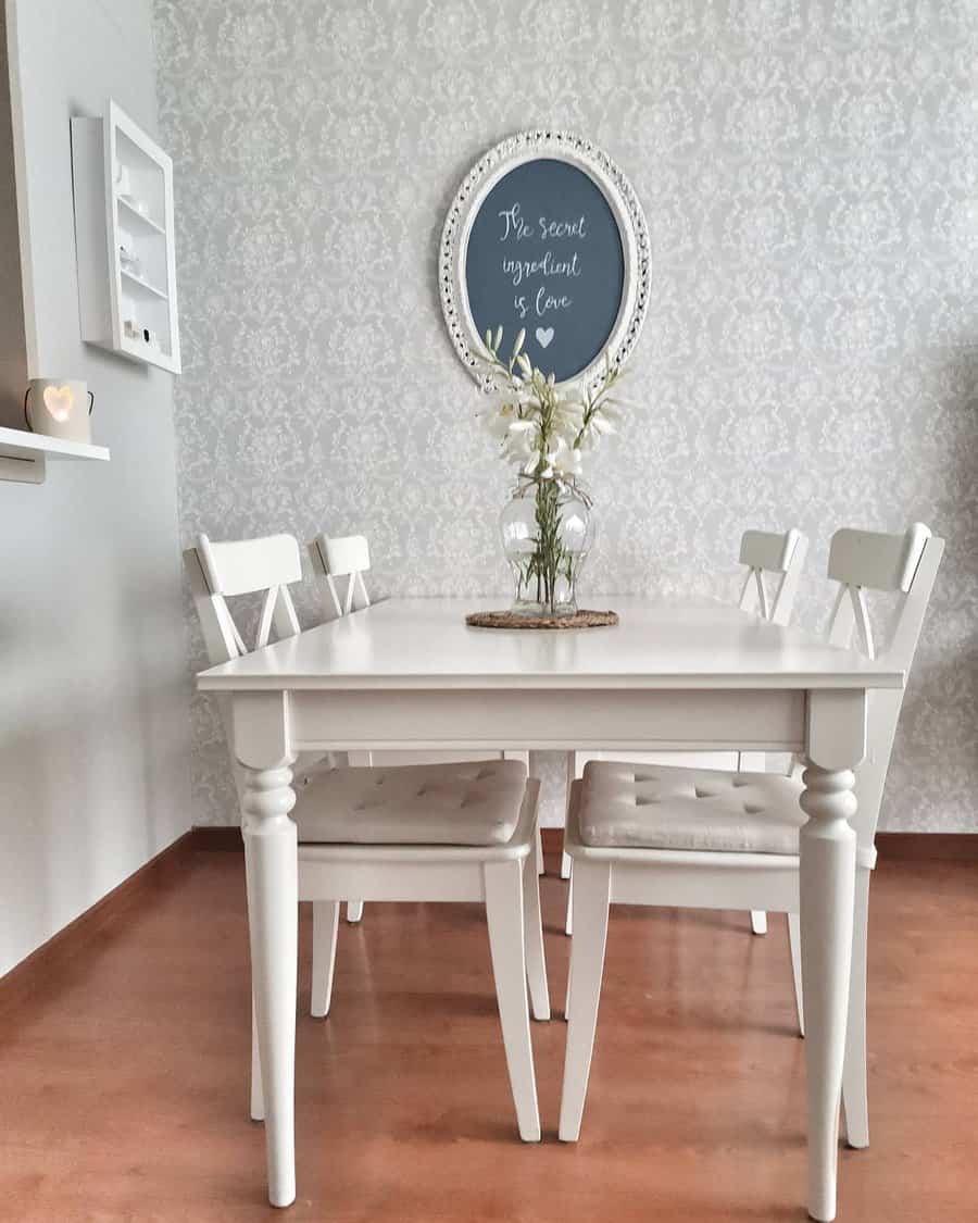 dining room with decorative wallpaper