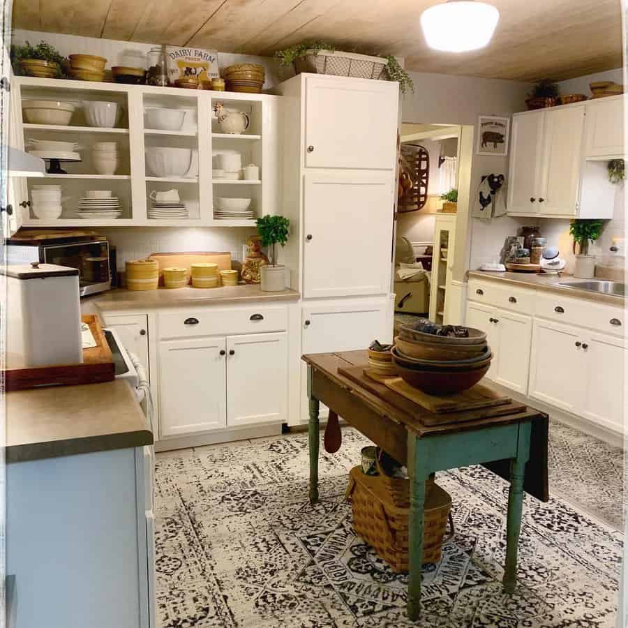 farmhouse kitchen with dinnerware cabinet