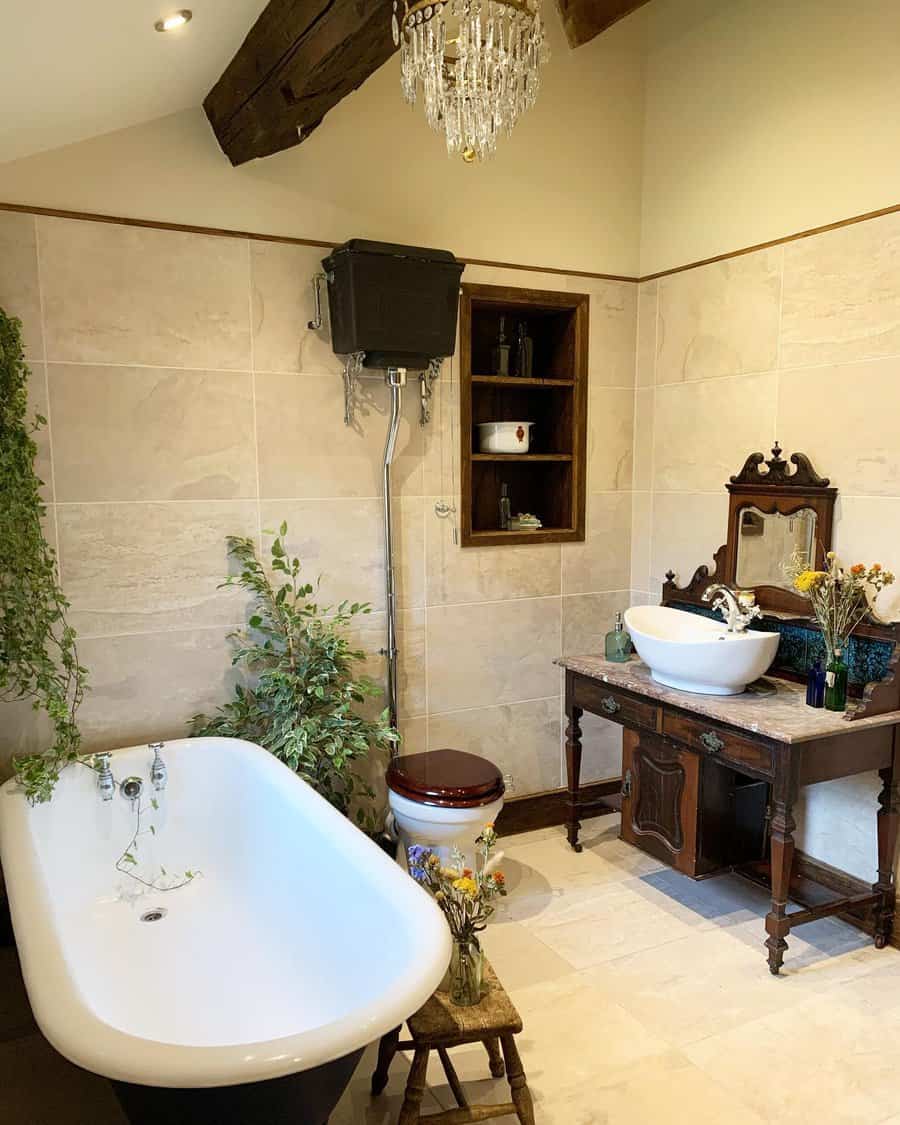 Rustic bathroom with chandelier and freestanding bathtub