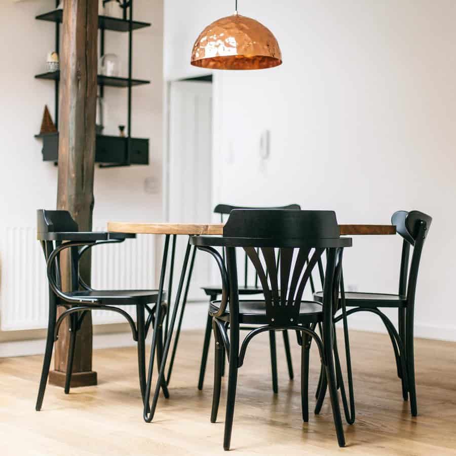 small dining room with black fixtures