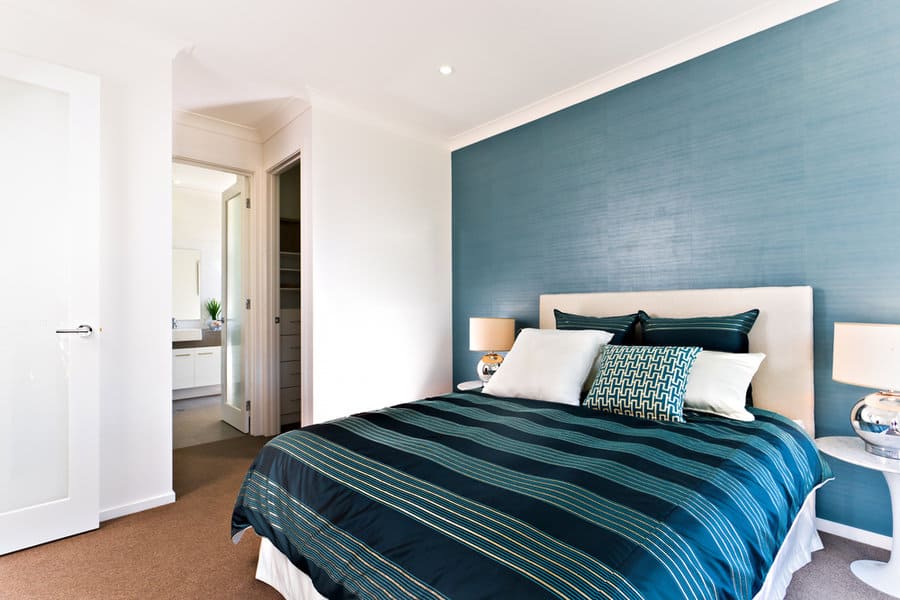 blue bedroom with blue accent wall
