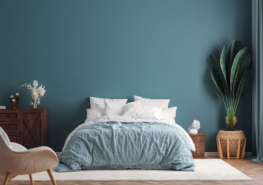 blue bedroom with plants
