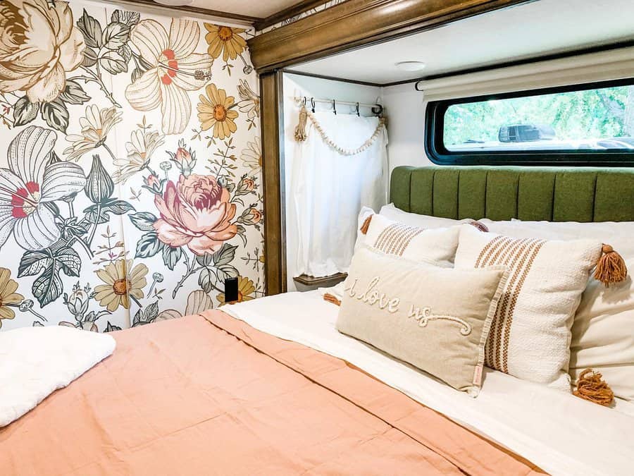 Bright RV bedroom with floral wallpaper