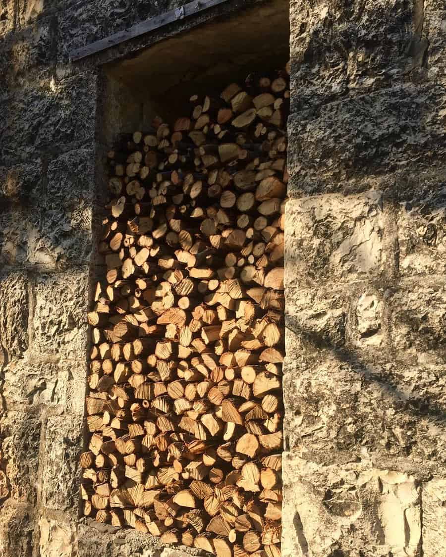 Wall mounted firewood rack