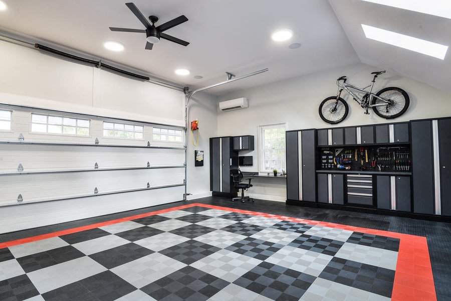 garage with white walls and swisstrax tiles