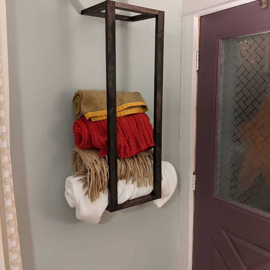 Wall mounted blanket rack