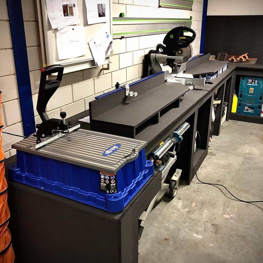 Industrial workbench with miter saw and tool stations