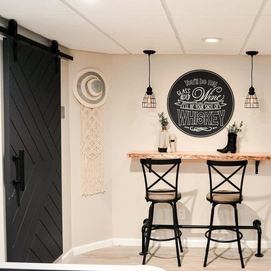 Chic wall-mounted bar with industrial stools and decor