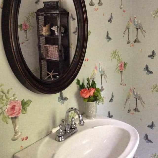 Half bathroom with fresh flowers