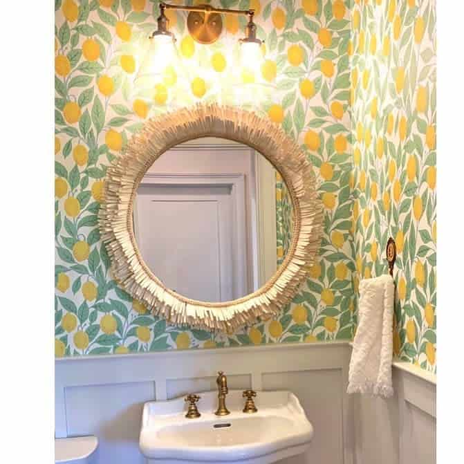 Half bathroom with gold fixtures