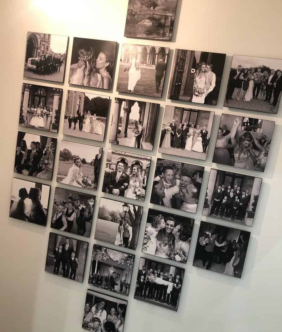 Heart-shaped collage of black and white wedding photos on a wall, featuring couples, bouquets, and celebratory moments