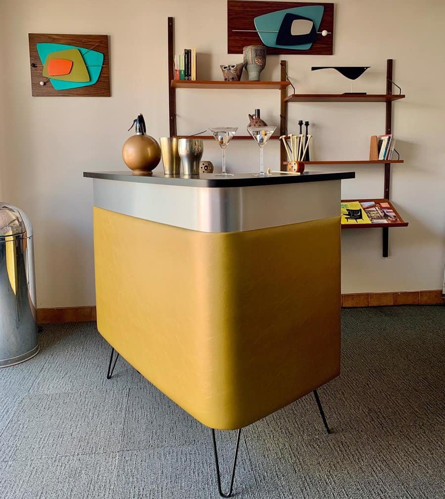 Retro style compact bar with a bold yellow finish and hairpin legs